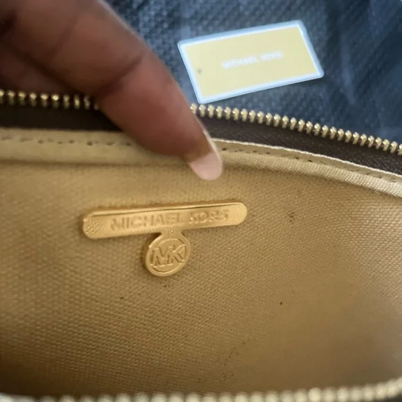 Michael Kors Brown Messenger Bag with Monogram Pattern
